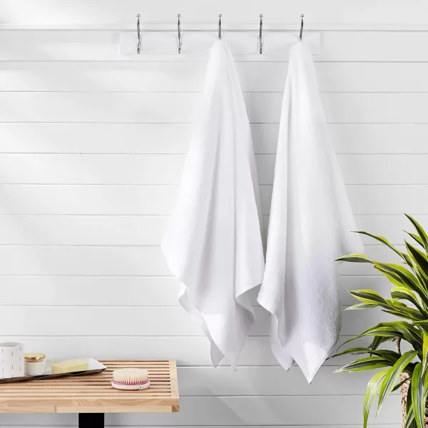 imageAmazon Basics  2 Piece QuickDry Oversize Bath Towel 100 Cotton Platinum 54quot x 30quotWhite