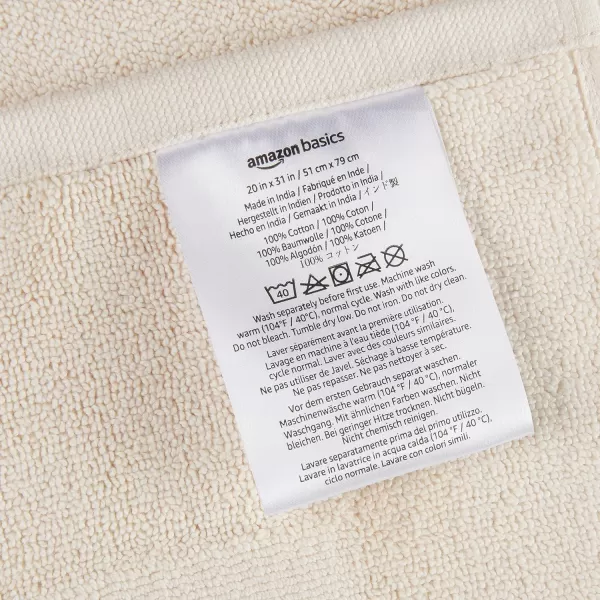 imageAmazon Basics Absorbent Cotton Machine Washable Bath Rug Mat for Shower Bright White 31quot L x 20quot WCream