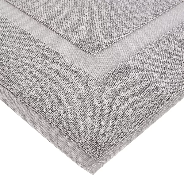 imageAmazon Basics Absorbent Cotton Machine Washable Bath Rug Mat for Shower Bright White 31quot L x 20quot WLight Gray
