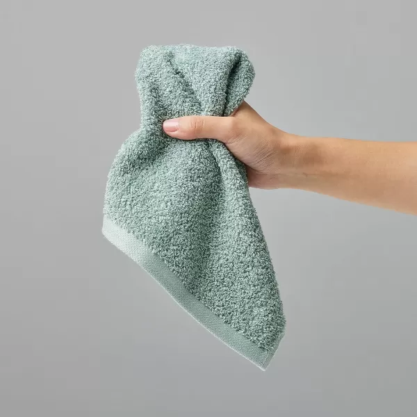 imageAmazon Basics face Towels for bathroom 100 Cotton Extra Absorbent washcloth Fast Drying salon towel  24 Pack Gray 12 x 12 inchesSeafoam Green