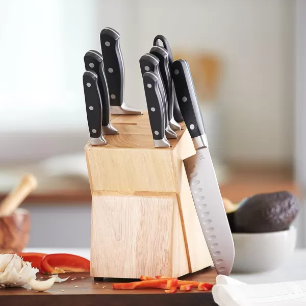 imageAmazon Basics 9 Pieces Premium HighCarbon StainlessSteel Blades with Pine Wood Knife Block Set Kitchen Black9Piece
