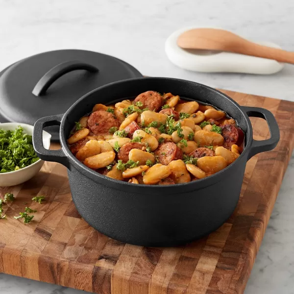 imageAmazon Basics Round PreSeasoned Cast Iron Mini Dutch Oven Pot with Lid and Dual Handles 2Quart Black2Quart