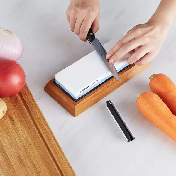 imageAmazon Basics Whetstone Knife Sharpening Wet Stone Dual Sided 4001000 and 30008000 Grit Stones Flattening Stone and NonSlip Bamboo Base 3 Count Pack of 1 Black ampamp GreyGrit 10006000