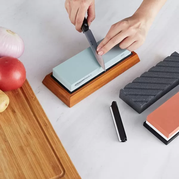 imageAmazon Basics Whetstone Knife Sharpening Wet Stone Dual Sided 4001000 and 30008000 Grit Stones Flattening Stone and NonSlip Bamboo Base 3 Count Pack of 1 Black ampamp Grey3piece set