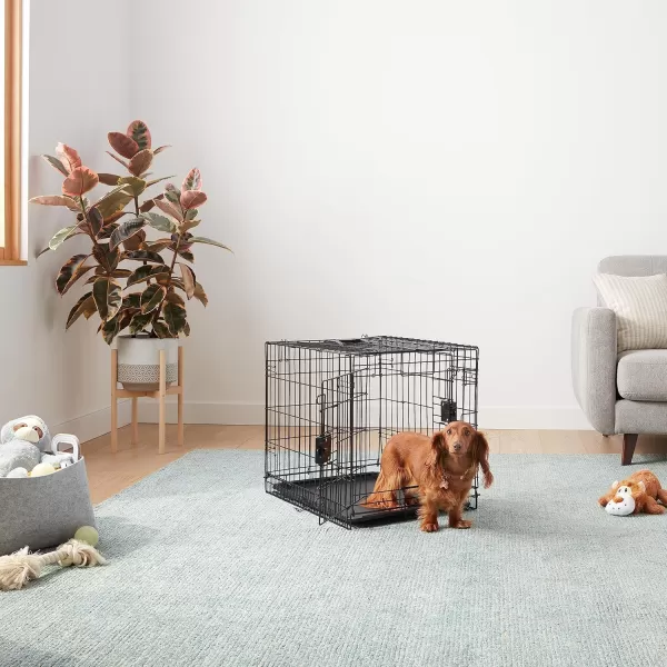 imageAmazon Basics  DurableFoldable Metal Wire Dog Crate with Tray Double Door Divider 24 x 18 x 20 Inches Black240L x 180W x 200H