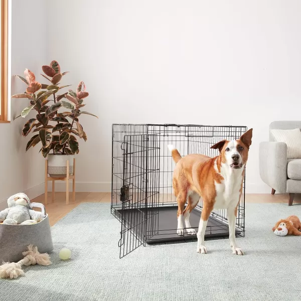 imageAmazon Basics  DurableFoldable Metal Wire Dog Crate with Tray Double Door Divider 24 x 18 x 20 Inches Black420L x 280W x 300H