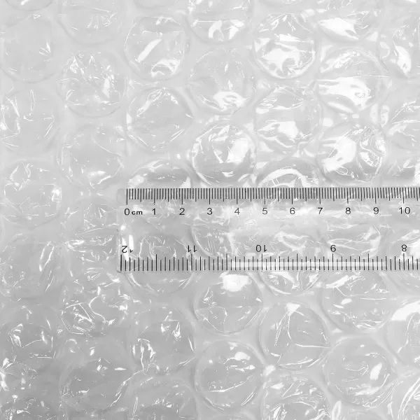 imageAmazon Basics Perforated Bubble Cushioning Wrap Large Clear 516quot 12Inch x 100Foot Long RollClear