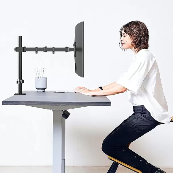 imageAmazon Basics Single Computer Monitor Stand with Tilt and Rotation Height Adjustable VESA Desk Arm Mount Steel 30 inches Black