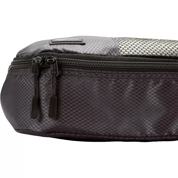 imageAmazon Basics Lightweight Packing Cubes for Travel 4 Piece Set With Double Zipper Pulls and Mesh Top Panel 100 Durable Polyester Small Sky BlueBlack