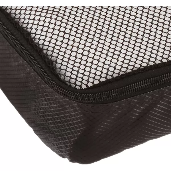 imageAmazon Basics Lightweight Packing Cubes for Travel 4 Piece Set With Double Zipper Pulls and Mesh Top Panel 100 Durable Polyester Small Sky BlueBlack