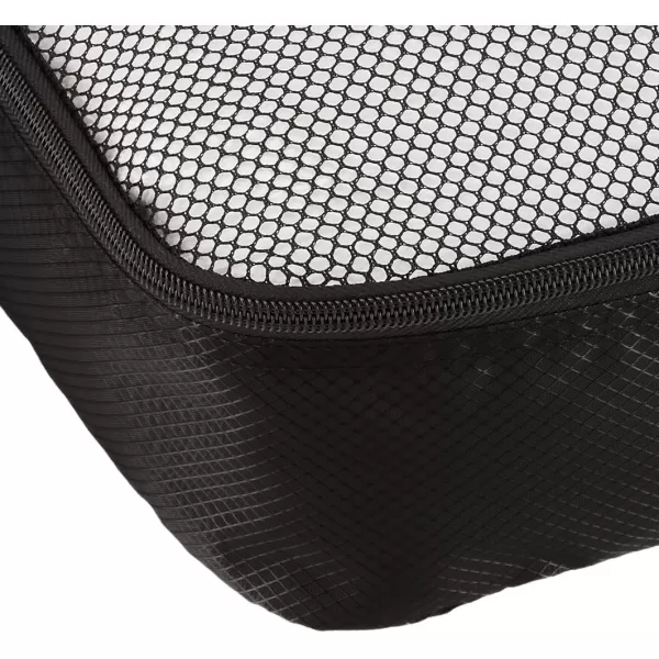 imageAmazon Basics Lightweight Packing Cubes for Travel 4 Piece Set With Double Zipper Pulls and Mesh Top Panel 100 Durable Polyester Small Sky BlueBlack