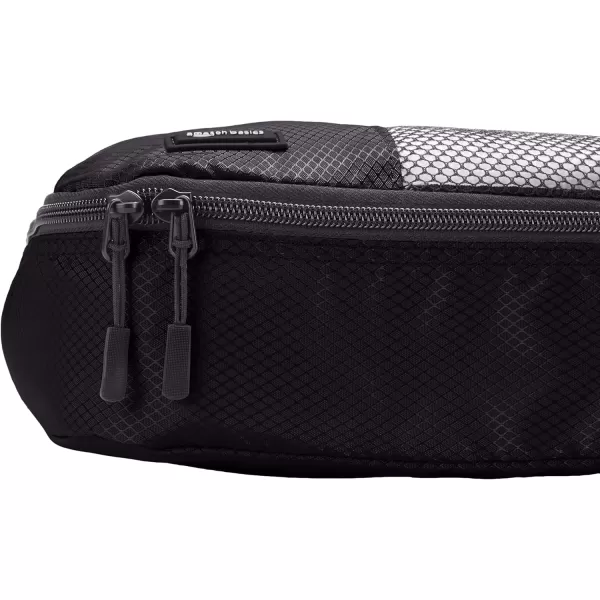 imageAmazon Basics Lightweight Packing Cubes for Travel 4 Piece Set With Double Zipper Pulls and Mesh Top Panel 100 Durable Polyester Small Sky BlueBlack