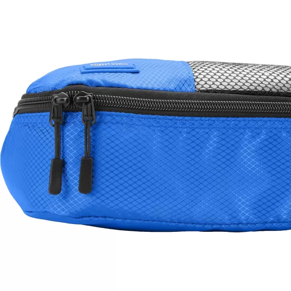 imageAmazon Basics Lightweight Packing Cubes for Travel 4 Piece Set With Double Zipper Pulls and Mesh Top Panel 100 Durable Polyester Small Sky BlueBlue