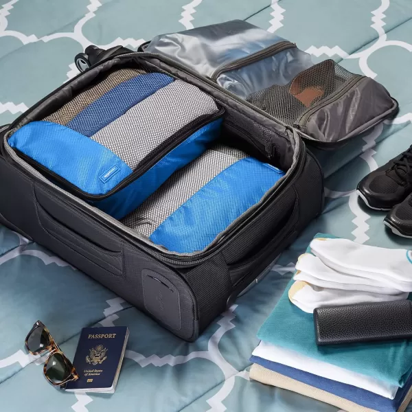 imageAmazon Basics Lightweight Packing Cubes for Travel 4 Piece Set With Double Zipper Pulls and Mesh Top Panel 100 Durable Polyester Small Sky BlueBlue