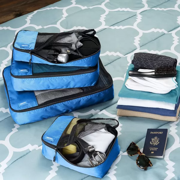 imageAmazon Basics Lightweight Packing Cubes for Travel 4 Piece Set With Double Zipper Pulls and Mesh Top Panel 100 Durable Polyester Small Sky BlueBlue