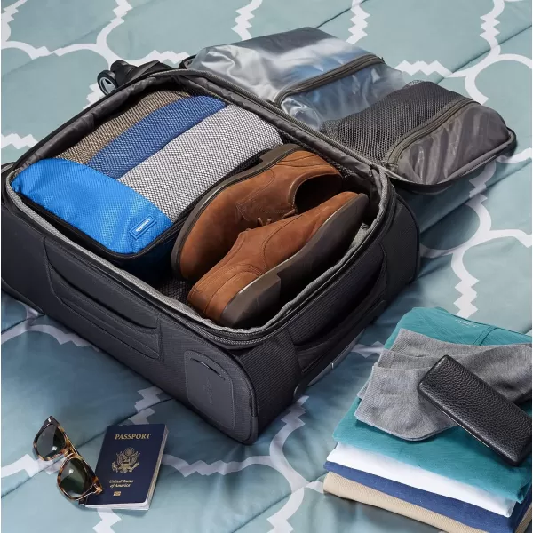 imageAmazon Basics Lightweight Packing Cubes for Travel 4 Piece Set With Double Zipper Pulls and Mesh Top Panel 100 Durable Polyester Small Sky BlueBlue