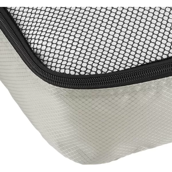 imageAmazon Basics Lightweight Packing Cubes for Travel 4 Piece Set With Double Zipper Pulls and Mesh Top Panel 100 Durable Polyester Small Sky BlueGray