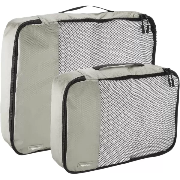 imageAmazon Basics Lightweight Packing Cubes for Travel 4 Piece Set With Double Zipper Pulls and Mesh Top Panel 100 Durable Polyester Small Sky BlueGray