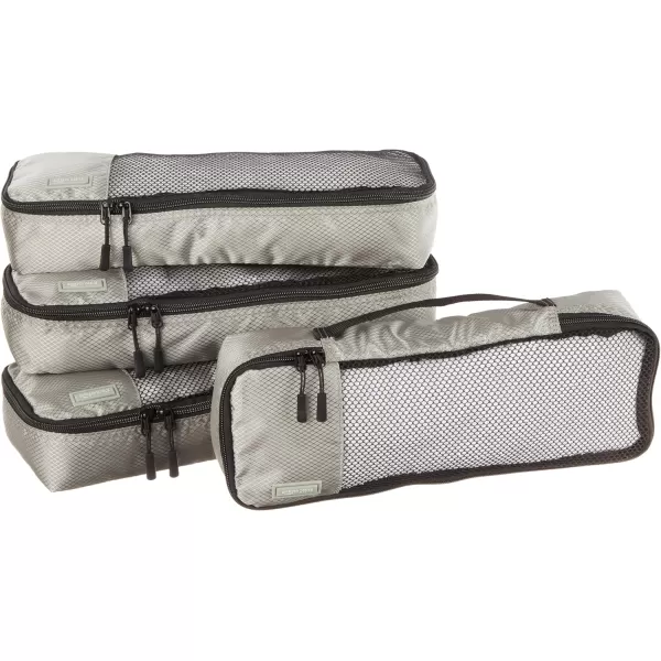 imageAmazon Basics Lightweight Packing Cubes for Travel 4 Piece Set With Double Zipper Pulls and Mesh Top Panel 100 Durable Polyester Small Sky BlueGray