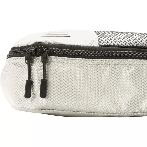 imageAmazon Basics Lightweight Packing Cubes for Travel 4 Piece Set With Double Zipper Pulls and Mesh Top Panel 100 Durable Polyester Small Sky BlueGray