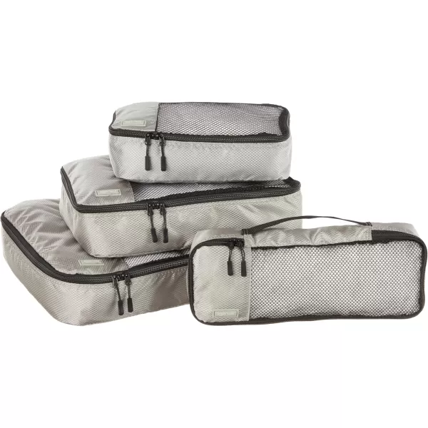 imageAmazon Basics Lightweight Packing Cubes for Travel 4 Piece Set With Double Zipper Pulls and Mesh Top Panel 100 Durable Polyester Small Sky BlueGray