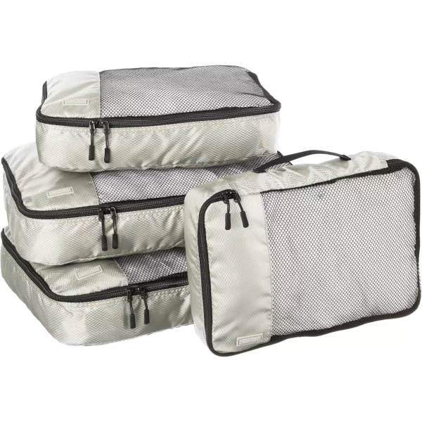 imageAmazon Basics Lightweight Packing Cubes for Travel 4 Piece Set With Double Zipper Pulls and Mesh Top Panel 100 Durable Polyester Small Sky BlueGray