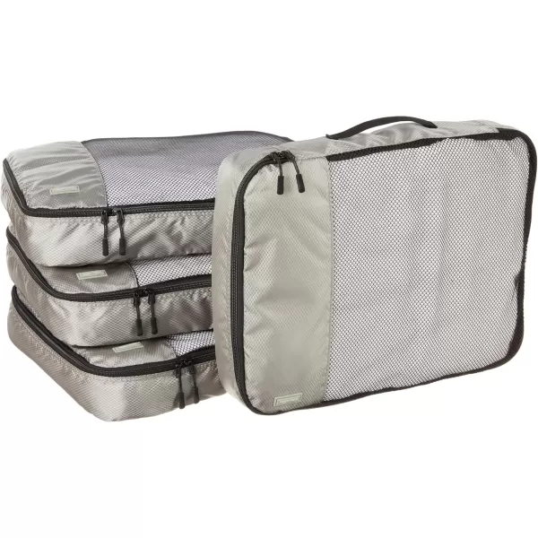 imageAmazon Basics Lightweight Packing Cubes for Travel 4 Piece Set With Double Zipper Pulls and Mesh Top Panel 100 Durable Polyester Small Sky BlueGray