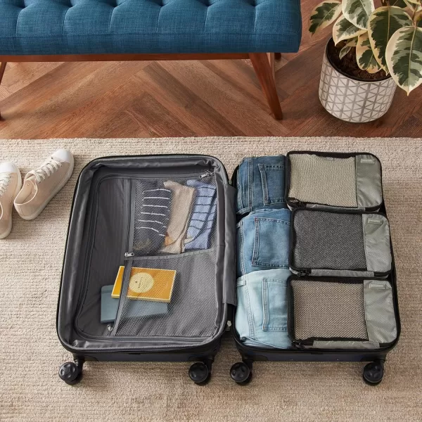 imageAmazon Basics Lightweight Packing Cubes for Travel 4 Piece Set With Double Zipper Pulls and Mesh Top Panel 100 Durable Polyester Small Sky BlueGray