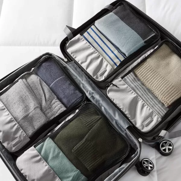 imageAmazon Basics Lightweight Packing Cubes for Travel 4 Piece Set With Double Zipper Pulls and Mesh Top Panel 100 Durable Polyester Small Sky BlueGray