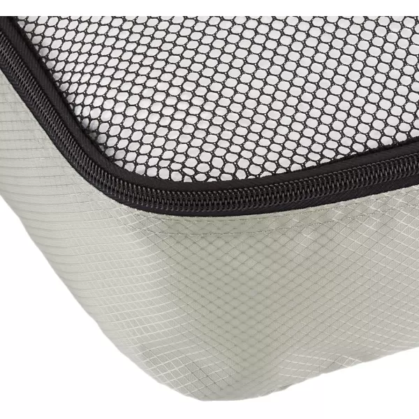 imageAmazon Basics Lightweight Packing Cubes for Travel 4 Piece Set With Double Zipper Pulls and Mesh Top Panel 100 Durable Polyester Small Sky BlueGray