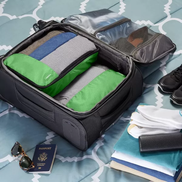 imageAmazon Basics Lightweight Packing Cubes for Travel 4 Piece Set With Double Zipper Pulls and Mesh Top Panel 100 Durable Polyester Small Sky BlueGreen