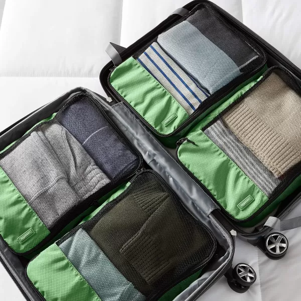 imageAmazon Basics Lightweight Packing Cubes for Travel 4 Piece Set With Double Zipper Pulls and Mesh Top Panel 100 Durable Polyester Small Sky BlueGreen