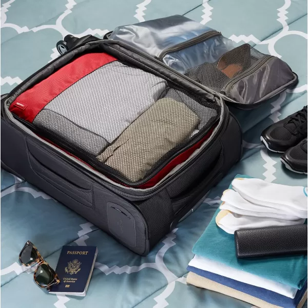 imageAmazon Basics Lightweight Packing Cubes for Travel 4 Piece Set With Double Zipper Pulls and Mesh Top Panel 100 Durable Polyester Small Sky BlueRed