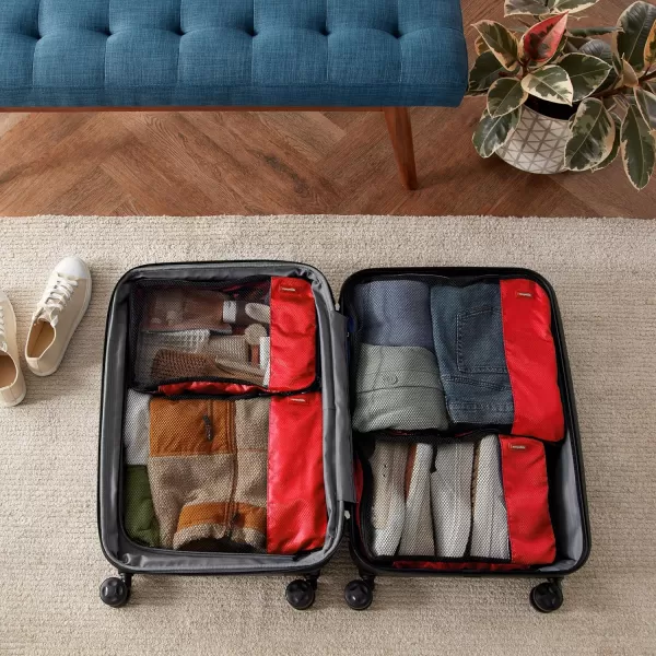 imageAmazon Basics Lightweight Packing Cubes for Travel 4 Piece Set With Double Zipper Pulls and Mesh Top Panel 100 Durable Polyester Small Sky BlueRed