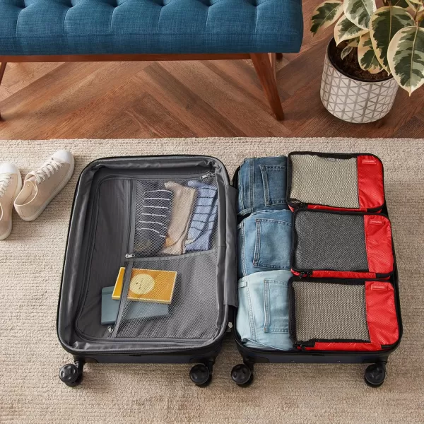 imageAmazon Basics Lightweight Packing Cubes for Travel 4 Piece Set With Double Zipper Pulls and Mesh Top Panel 100 Durable Polyester Small Sky BlueRed