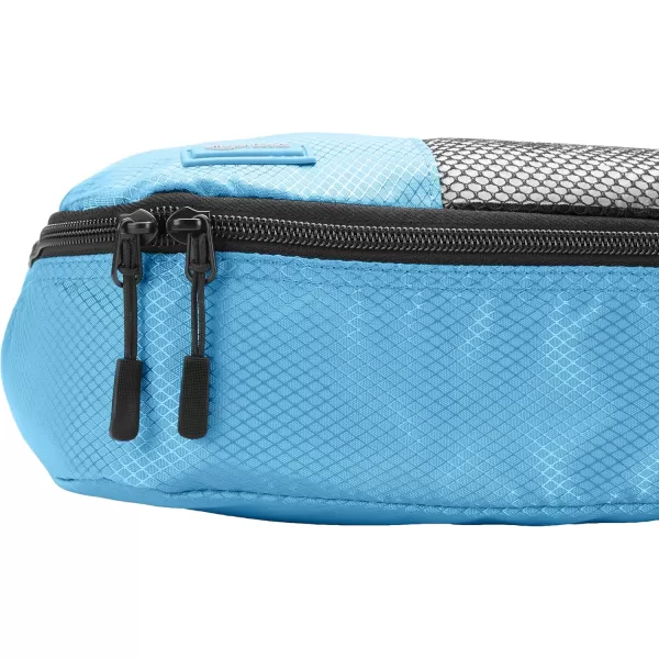imageAmazon Basics Lightweight Packing Cubes for Travel 4 Piece Set With Double Zipper Pulls and Mesh Top Panel 100 Durable Polyester Small Sky BlueSky Blue