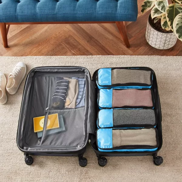 imageAmazon Basics Lightweight Packing Cubes for Travel 4 Piece Set With Double Zipper Pulls and Mesh Top Panel 100 Durable Polyester Small Sky BlueSky Blue