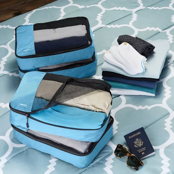imageAmazon Basics Lightweight Packing Cubes for Travel 4 Piece Set With Double Zipper Pulls and Mesh Top Panel 100 Durable Polyester Small Sky BlueSky Blue