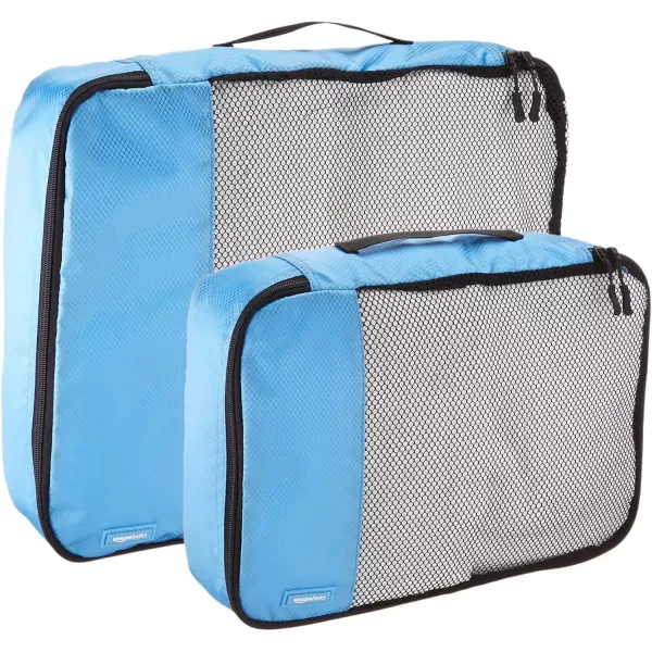 imageAmazon Basics Lightweight Packing Cubes for Travel 4 Piece Set With Double Zipper Pulls and Mesh Top Panel 100 Durable Polyester Small Sky BlueSky Blue