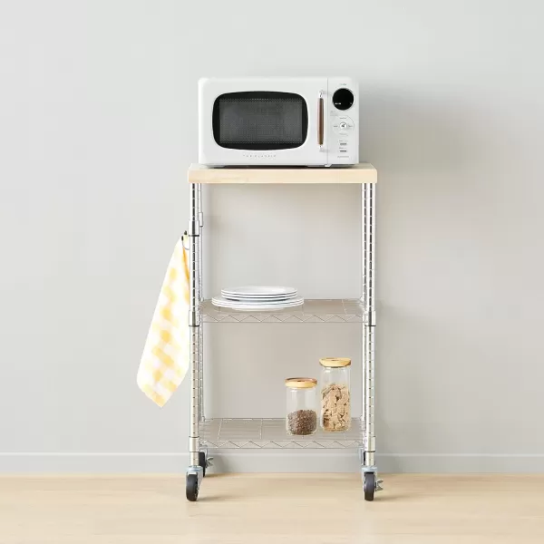 imageAmazon Basics Portable Kitchen Storage Rack on Caster Wheels with Adjustable Shelves 175 Pound Capacity 21 x 15 x 367 inches LxWxH WoodChrome