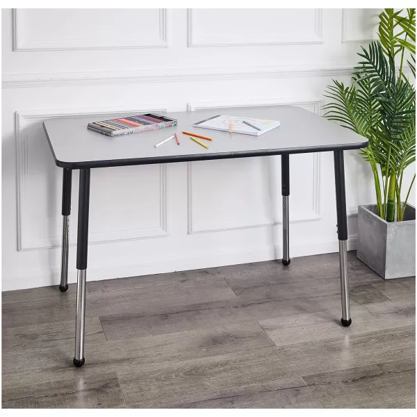 imageAmazon Basics Rectangular School Activity Kids Writing Desk Ball Glide Legs Adjustable Height 1930 Inch Grey TopBlack Edge 47quot W x 29quot L x 30quot H47W x 29L x 30H