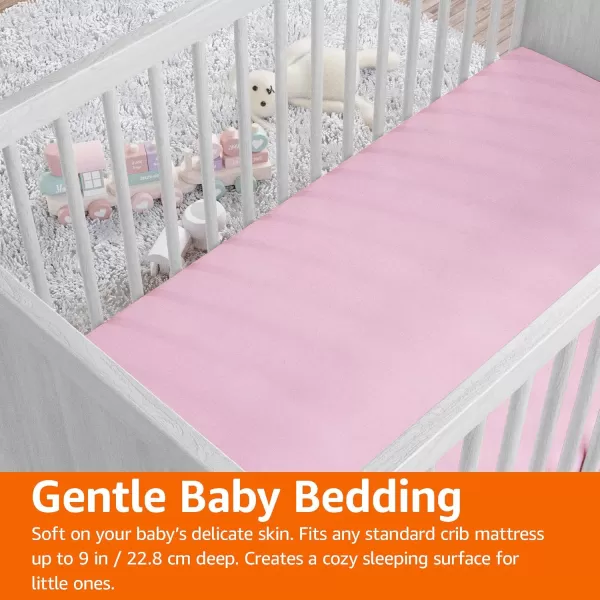 imageAmazon Basics 100 Cotton Jersey Knit Fitted Crib Sheet for Boys and Girls fits Standard Crib and Toddler Mattress Breathable Super Soft 28 x 52 Inches WhitePink