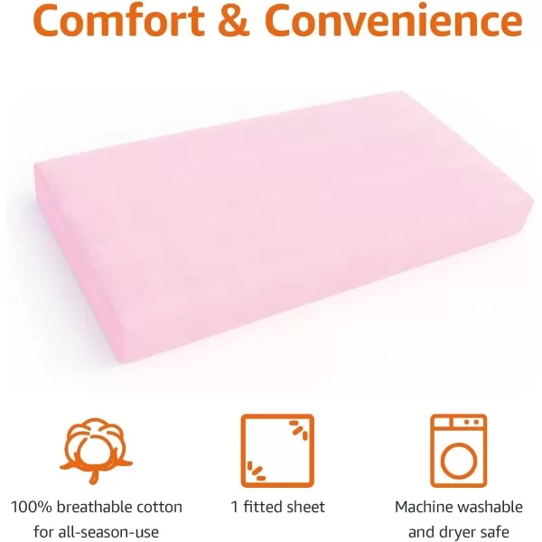 imageAmazon Basics 100 Cotton Jersey Knit Fitted Crib Sheet for Boys and Girls fits Standard Crib and Toddler Mattress Breathable Super Soft 28 x 52 Inches WhitePink