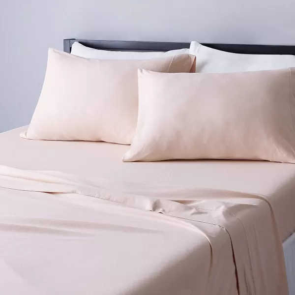 imageAmazon Basics 3 Piece Bed Sheets Set 100 Cotton Jersey Includes Super Soft Flat and Fitted Sheets Pillowcase 28 x 52 Inches Toddler White SolidBlush