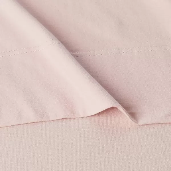 imageAmazon Basics 3 Piece Bed Sheets Set 100 Cotton Jersey Includes Super Soft Flat and Fitted Sheets Pillowcase 28 x 52 Inches Toddler White SolidBlush