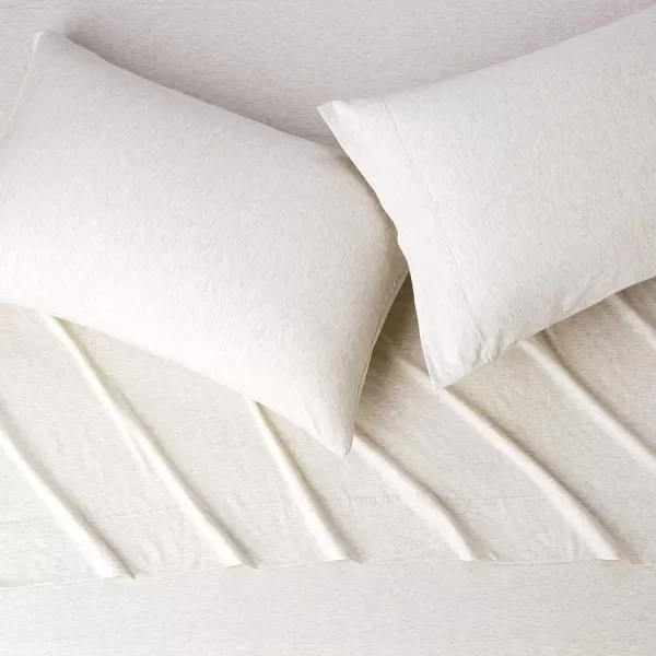 imageAmazon Basics 3 Piece Bed Sheets Set 100 Cotton Jersey Includes Super Soft Flat and Fitted Sheets Pillowcase 28 x 52 Inches Toddler White SolidOatmeal