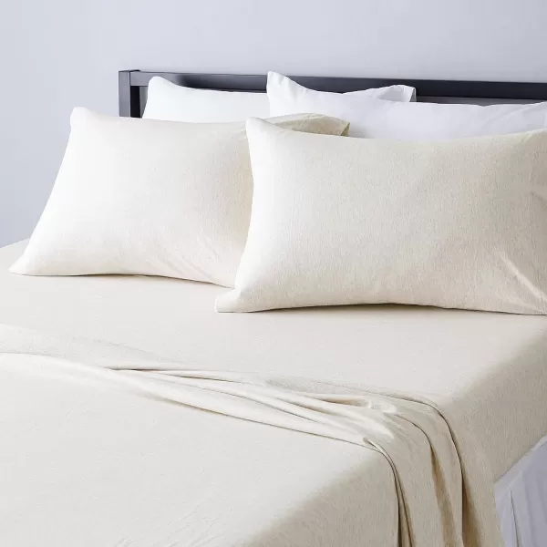 imageAmazon Basics 3 Piece Bed Sheets Set 100 Cotton Jersey Includes Super Soft Flat and Fitted Sheets Pillowcase 28 x 52 Inches Toddler White SolidOatmeal
