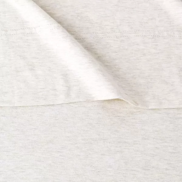imageAmazon Basics 3 Piece Bed Sheets Set 100 Cotton Jersey Includes Super Soft Flat and Fitted Sheets Pillowcase 28 x 52 Inches Toddler White SolidOatmeal