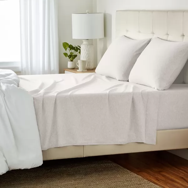 imageAmazon Basics 3 Piece Bed Sheets Set 100 Cotton Jersey Includes Super Soft Flat and Fitted Sheets Pillowcase 28 x 52 Inches Toddler White SolidOatmeal