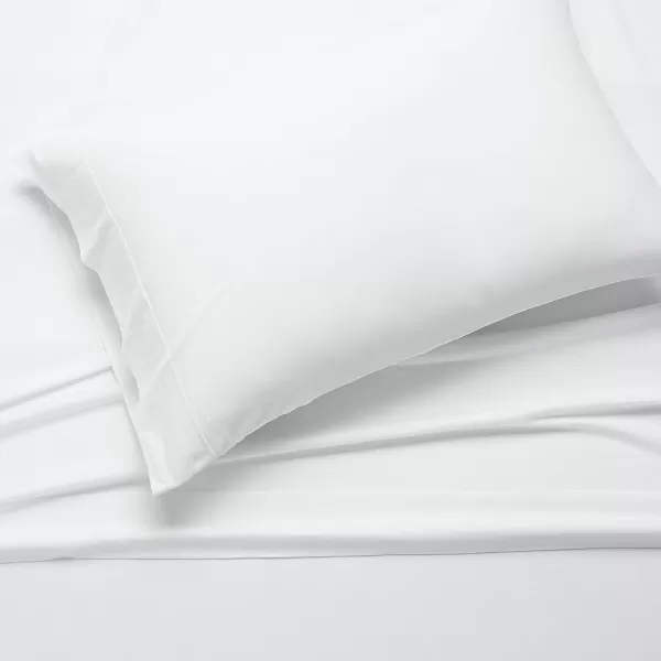 imageAmazon Basics 3 Piece Bed Sheets Set 100 Cotton Jersey Includes Super Soft Flat and Fitted Sheets Pillowcase 28 x 52 Inches Toddler White SolidWhite